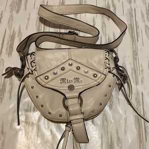 Miss Me off white Purse , zippers all work great , nice in the inside
